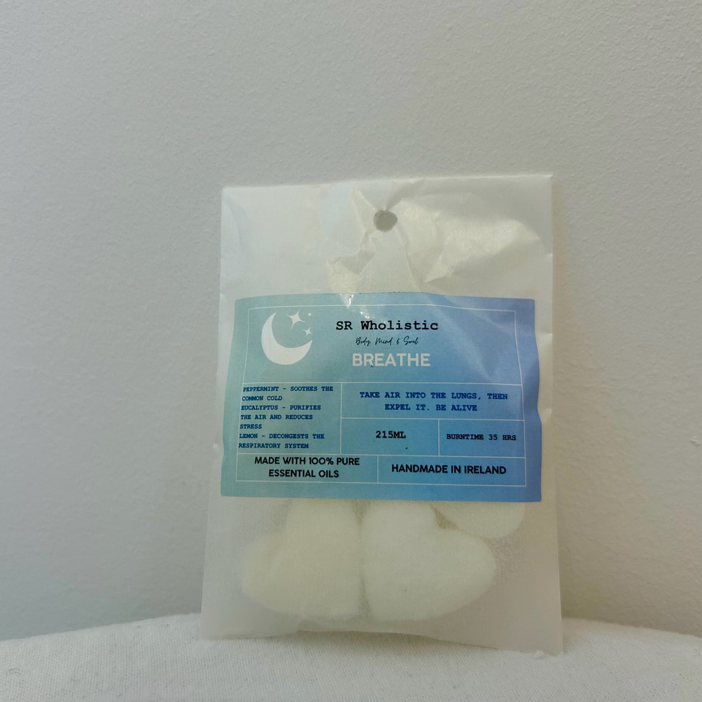 “Breathe Wax Melts – Peppermint, Eucalyptus & Lemon blend in eco-friendly packaging with visible heart-shaped melts.”
