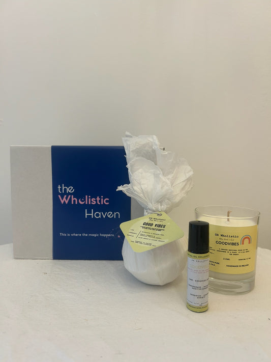 "Goodvibes Gift Set displayed beside its bright gift box, featuring an energizing trio of candle, bath bomb, and rollerball infused with lemon, lime, and geranium essential oils."