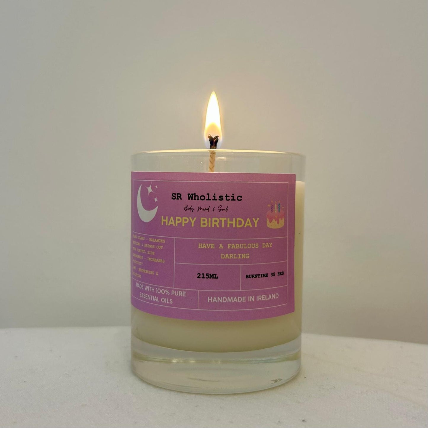 "Happy Birthday candle burning gently, casting a warm, joyful glow perfect for celebrations."