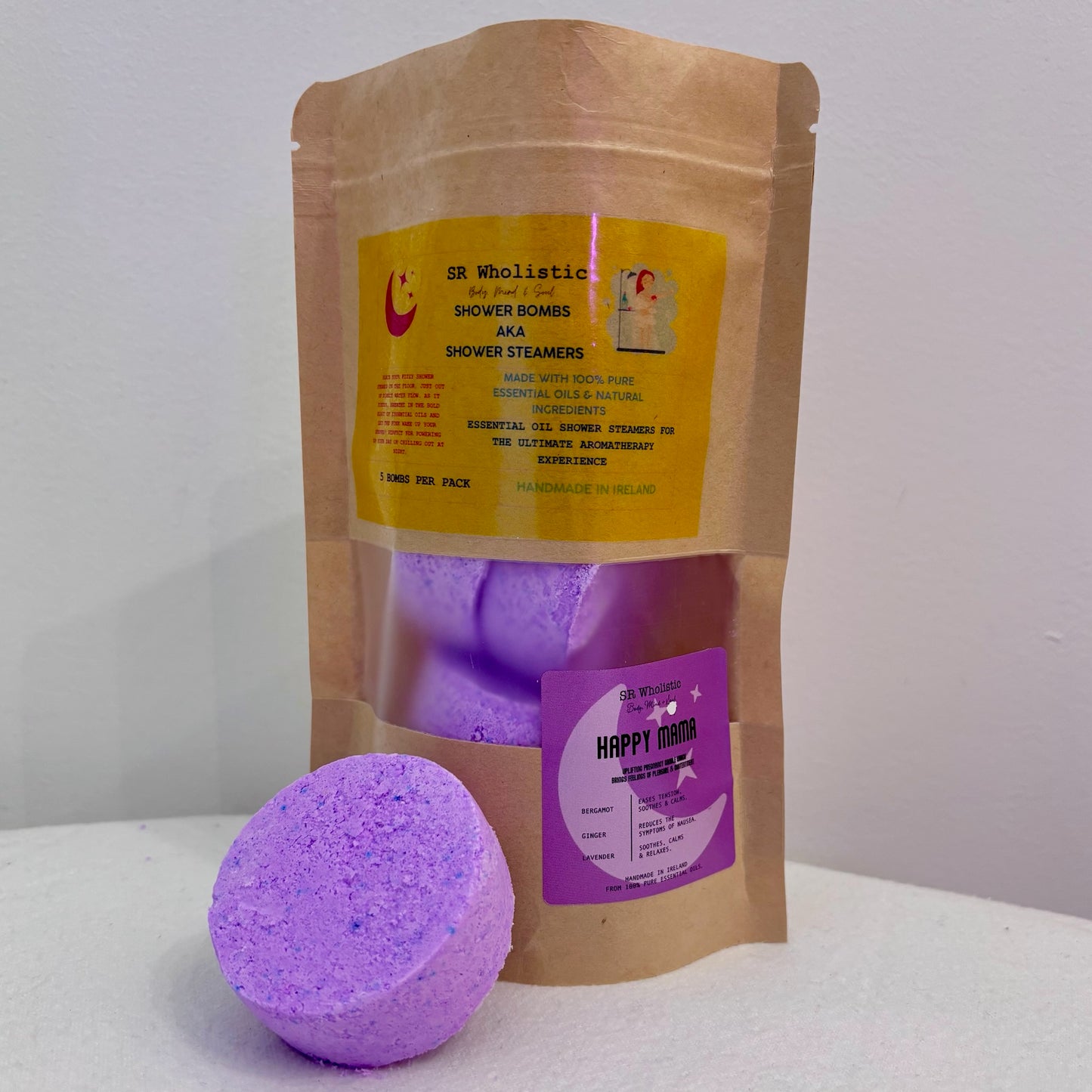 Happy Mama Shower Bombs pouch with one aromatherapy bomb placed outside for display