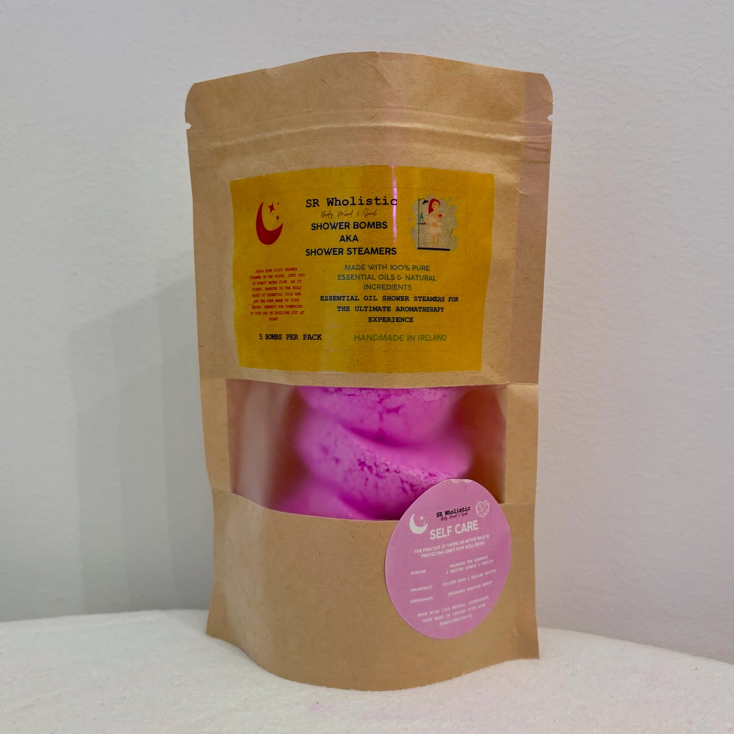 Self Care Shower Bombs packet sealed with five Jasmine, lemongrass & grapefruit shower bombs visible inside