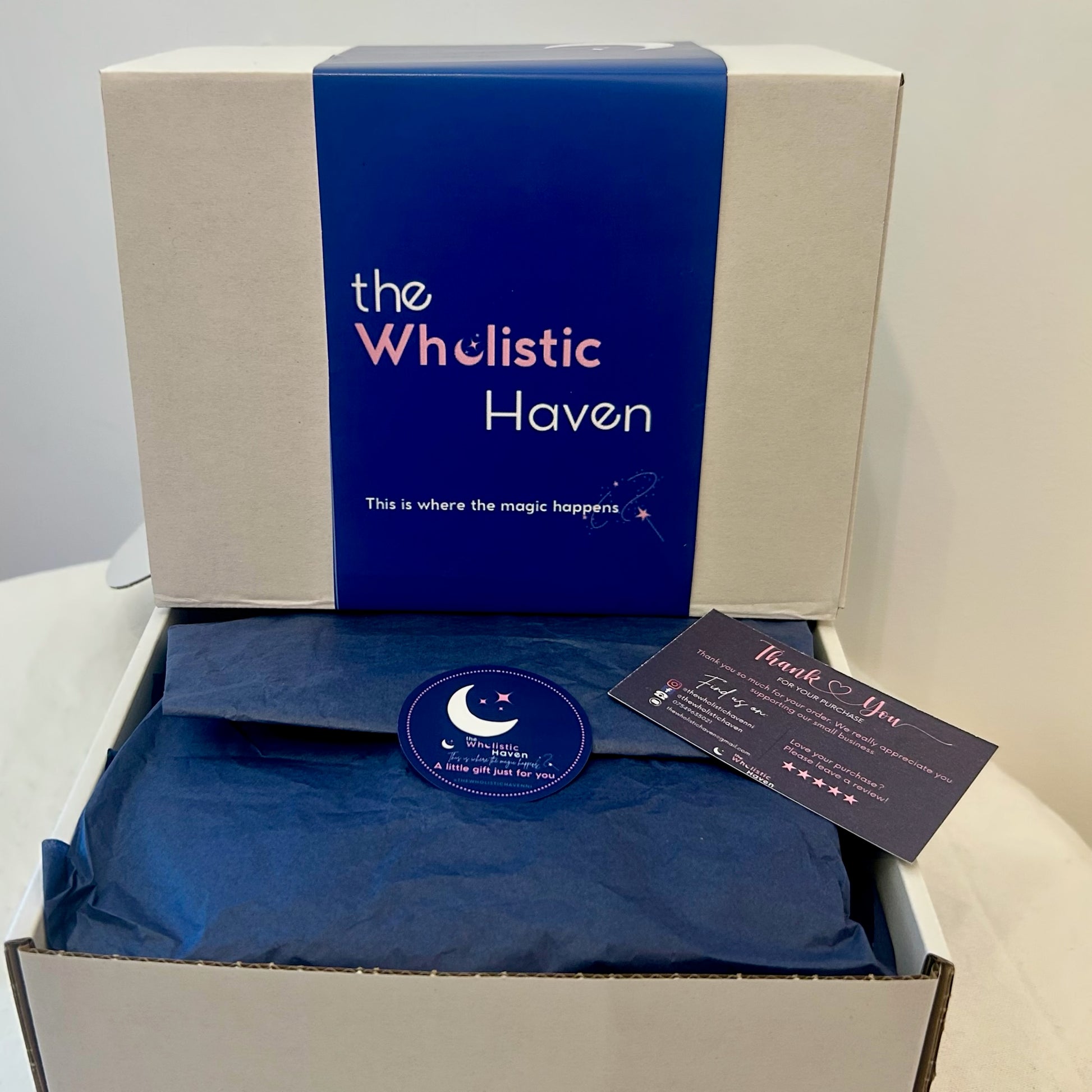 "The Wholistic Haven Gift Box – elegantly closed and wrapped in eco-friendly kraft branded paper  ready for gifting and filled with handcrafted holistic wellness products."