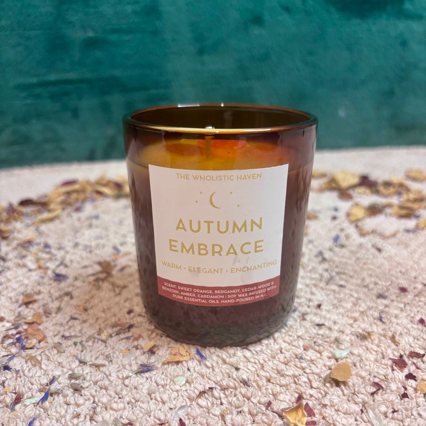 Autumn Embrace candle with amber-toned label, 250ml glass jar, hand-poured soy wax