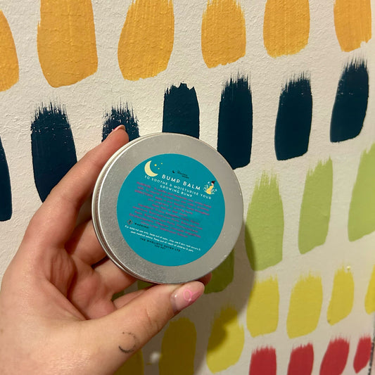 60ml tin of Bump Balm by The Wholistic Haven, a natural belly butter with lavender, frankincense & myrrh, crafted to soothe and support stretching pregnancy skin.