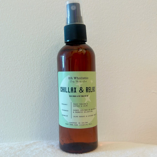 Spritzing Chillax & Relax Essential Oil Spray to create a peaceful environment