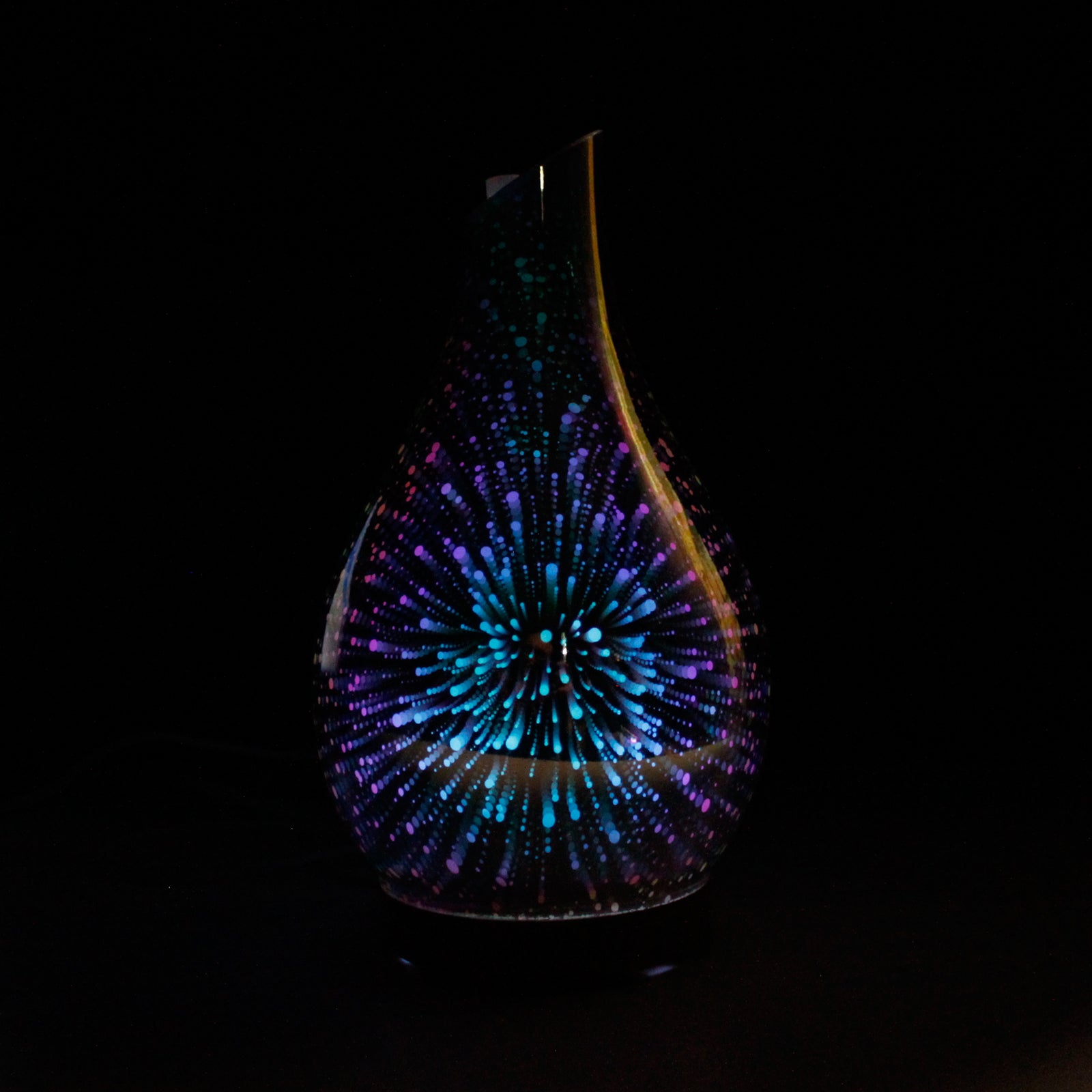Vase with colorful, starburst pattern on a black background