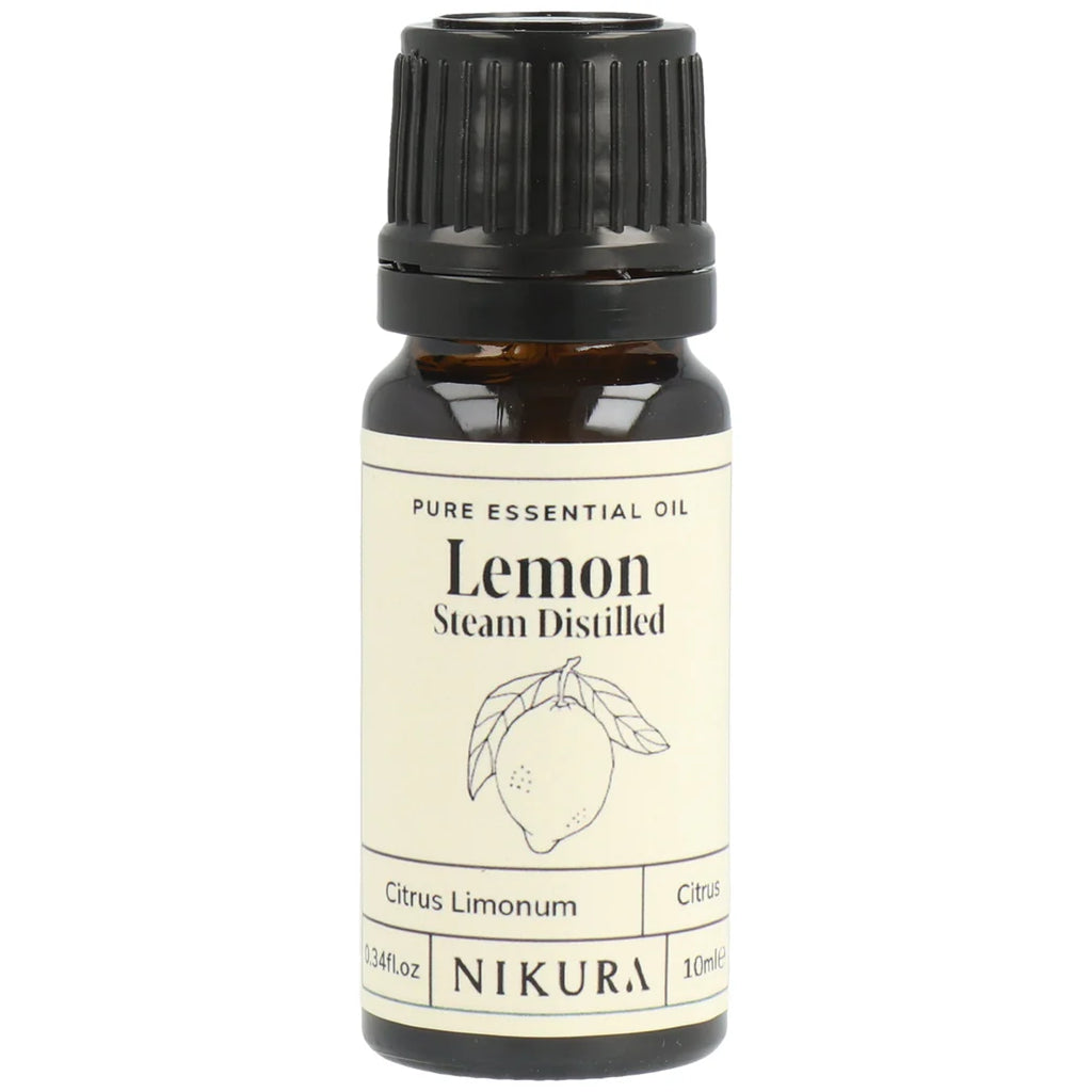 Nikura lemon essential oil bottle on a white background