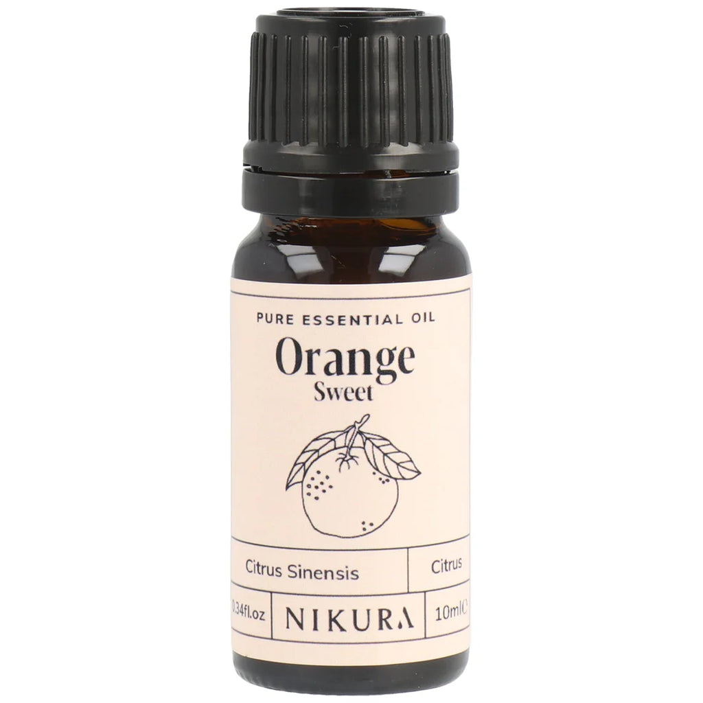 Orange sweet essential oil bottle with Nikura label on a white background