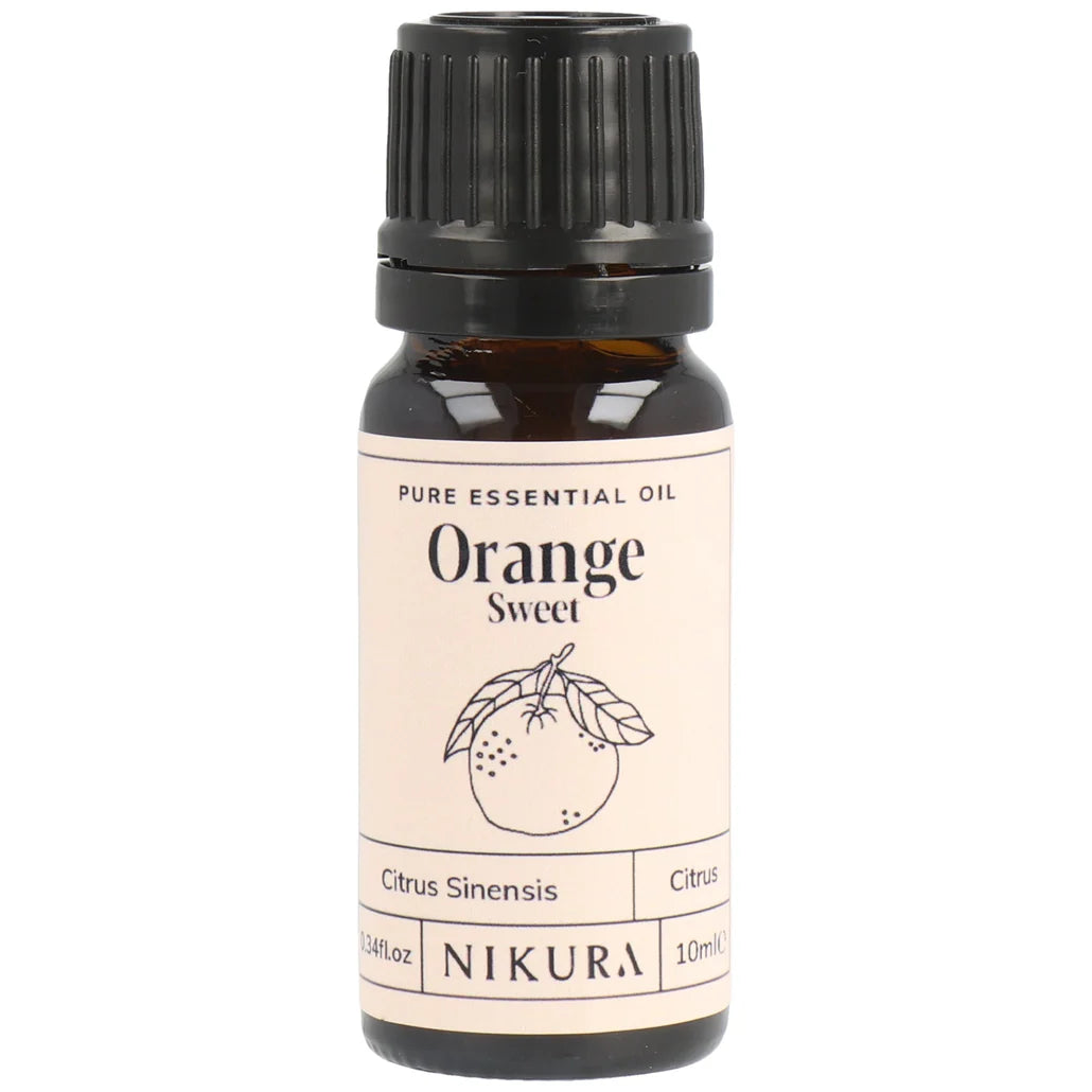 Orange sweet essential oil bottle with Nikura label on a white background