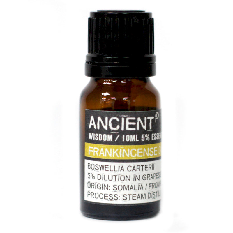 Bottle of frankincense essential oil with a black cap on a white background
