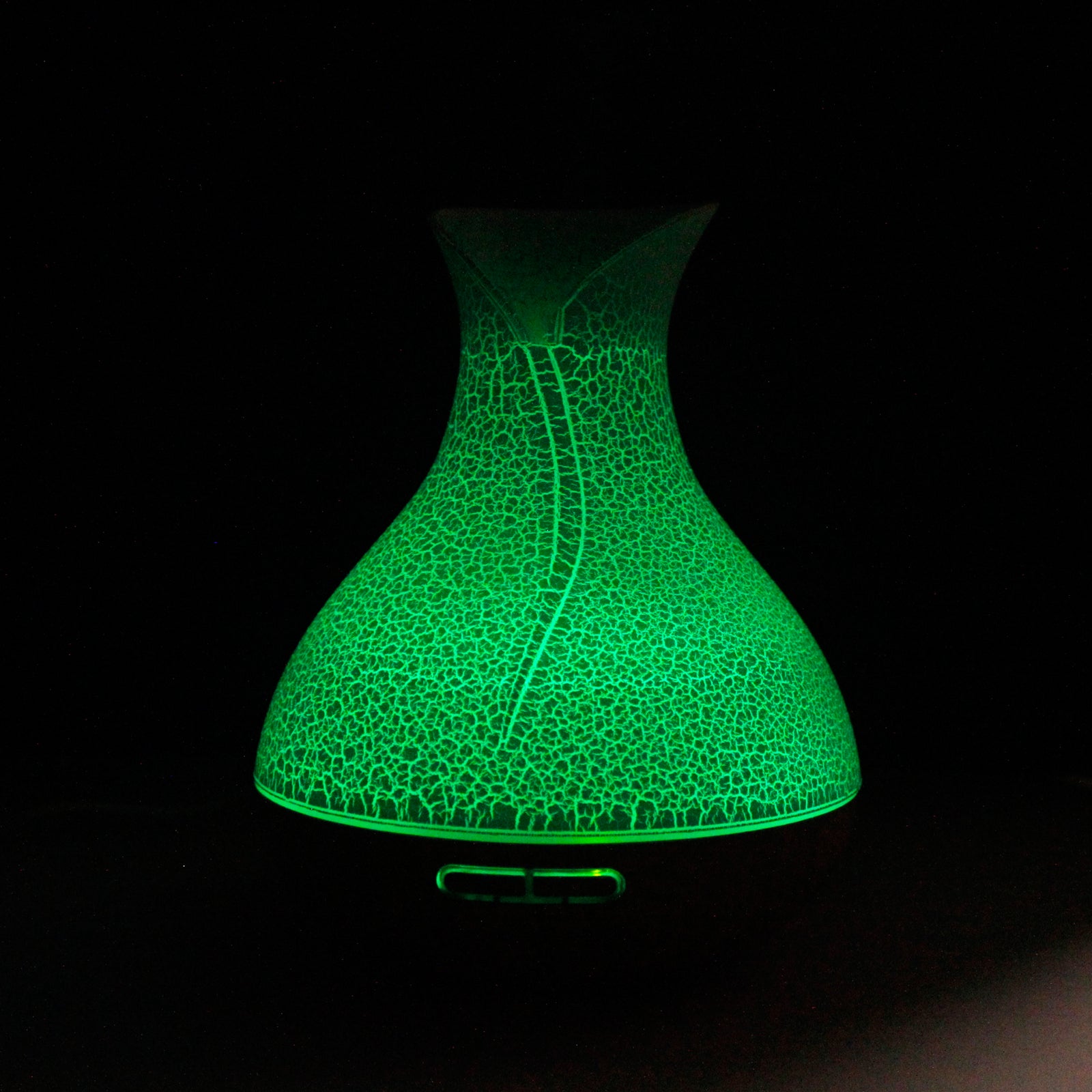 Green textured diffuser on a black background